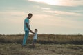 Loving family. Father and his son baby boy playing and hugging outdoors. Happy dad and son outdoors. Concept of Father`s day. Royalty Free Stock Photo