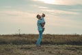 Loving family. Father and his son baby boy playing and hugging outdoors. Happy dad and son outdoors. Concept of Father`s day. Royalty Free Stock Photo