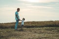 Loving family. Father and his son baby boy playing and hugging outdoors. Happy dad and son outdoors. Concept of Father`s day. Royalty Free Stock Photo