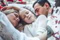 Loving family sleeping together lying in the bed Royalty Free Stock Photo