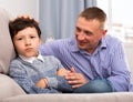 Father consoling sad son Royalty Free Stock Photo