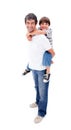 Loving father giving his son piggyback ride Royalty Free Stock Photo