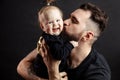 Father kissing adorable baby Royalty Free Stock Photo