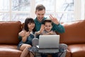 Loving father with little daughter and son using video call. Royalty Free Stock Photo