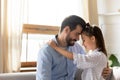 Loving father and little daughter touching foreheads, enjoying tender moment Royalty Free Stock Photo