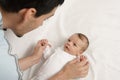 Loving father playing with his new born baby. Royalty Free Stock Photo