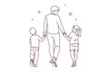 Loving father walking with small children