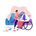 Loving grandchild feeding his old disabled granny in the wheelchair holding and supporting her Royalty Free Stock Photo