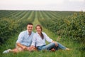 Loving guy and girl walking in nature.concept of love story outdoor.Lovers Walking in spring park.stylish couple in love hugging Royalty Free Stock Photo