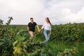 Loving guy and girl walking in nature.concept of love story outdoor.Lovers Walking in spring park.stylish couple in love