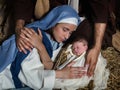 Loving hands in nativity scene Royalty Free Stock Photo