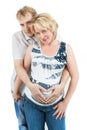 Loving happy couple, pregnant woman with her husband, isolated on white Royalty Free Stock Photo