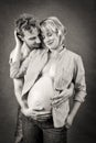 Loving happy couple, pregnant woman with her husband Royalty Free Stock Photo