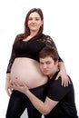 Loving happy couple, smiling pregnant woman with her husband Royalty Free Stock Photo