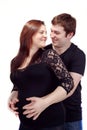 Loving happy couple, smiling pregnant woman with her husband Royalty Free Stock Photo