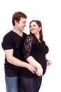 Loving happy couple, smiling pregnant woman with her husband Royalty Free Stock Photo