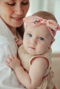 Loving happy mum carrying of newborn baby at home Royalty Free Stock Photo