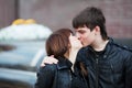 Happy young fashion couple in love kissing outdoor Royalty Free Stock Photo