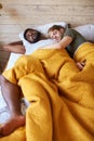 Loving Male Gay Couple Sleeping In Bed At Home Together Royalty Free Stock Photo