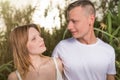 Loving man and happy woman in a spring blooming park Royalty Free Stock Photo