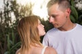 Loving man and happy woman in a spring blooming park Royalty Free Stock Photo