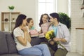 Loving man with twin daughters congratulate his mother on his mother's day or birthday.