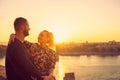 Loving man and womanoutdoor dating in sunset