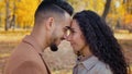 Loving married couple standing foreheads touched and rubbing noses enamored smiling happily outdoors look into each Royalty Free Stock Photo