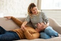 Loving Middle Aged Couple Relaxing On Couch At Home Royalty Free Stock Photo