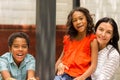 Happy loving mixed race family smiling outside. Royalty Free Stock Photo