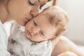 Loving mom carying of her newborn baby at home Royalty Free Stock Photo