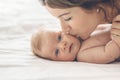 Loving mom carying of her newborn baby at home Royalty Free Stock Photo