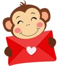 Loving monkey holding a valentine letter envelope