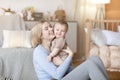 Loving mother bonding with her little cute kid at home Royalty Free Stock Photo