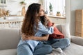 Loving mother comforting hugging unhappy teenage daughter, mom supporting depressed teen girl child Royalty Free Stock Photo