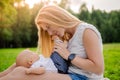 Loving mother with her newborn baby on her arms. Royalty Free Stock Photo