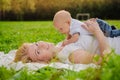 Loving mother with her newborn baby on her arms. Royalty Free Stock Photo