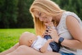 Loving mother with her newborn baby on her arms. Royalty Free Stock Photo