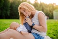 Loving mother with her newborn baby on her arms. Royalty Free Stock Photo