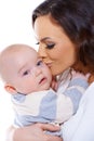 Loving mother kissing her small baby Royalty Free Stock Photo