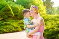 Loving Mother and son playing in summer park Royalty Free Stock Photo