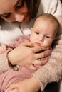 Young mother with her newborn baby at home. Happy family concept. Royalty Free Stock Photo