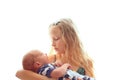 Loving older sister blonde sweetheart touching and gentle holds her newborn brother in her arms, cute tiny baby. Royalty Free Stock Photo