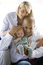 Loving parents with baby in dad's arms Royalty Free Stock Photo