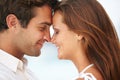 A loving proposal - Engagement. A closeup of two young lovers sharing an intimate moment together. Royalty Free Stock Photo