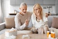 Loving retired man husband taking care of his sick wife Royalty Free Stock Photo