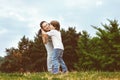 Loving son kissing his happy mother Royalty Free Stock Photo