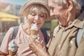 Loving spouse feeding his wife with dessert Royalty Free Stock Photo