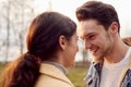 Loving Transgender Couple Enjoying Walk In Autumn Or Winter Countryside