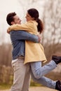 Loving Transgender Couple Enjoying Walk In Autumn Or Winter Countryside